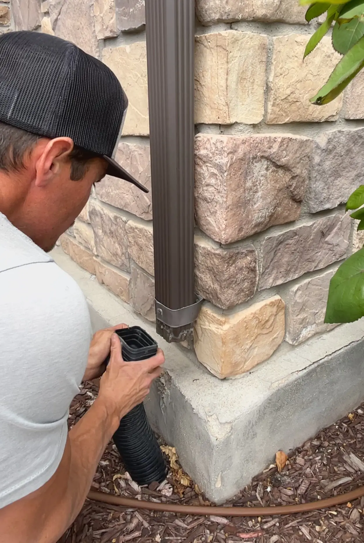 preparing downspout drain for cleaning